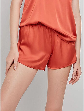 Pantaloncino in tessuto satinato con dettagli in pizzo