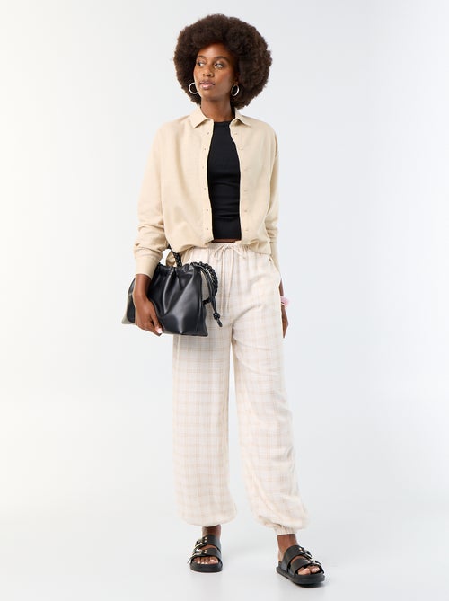 Pantalone a palloncino tinta unita con 2 tasche - Kiabi Pantalone a palloncino tinta unita con 2 tasche - Kiabi