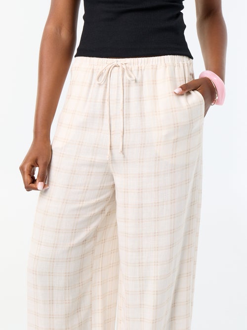 Pantalone a palloncino tinta unita con 2 tasche - Kiabi Pantalone a palloncino tinta unita con 2 tasche - Kiabi