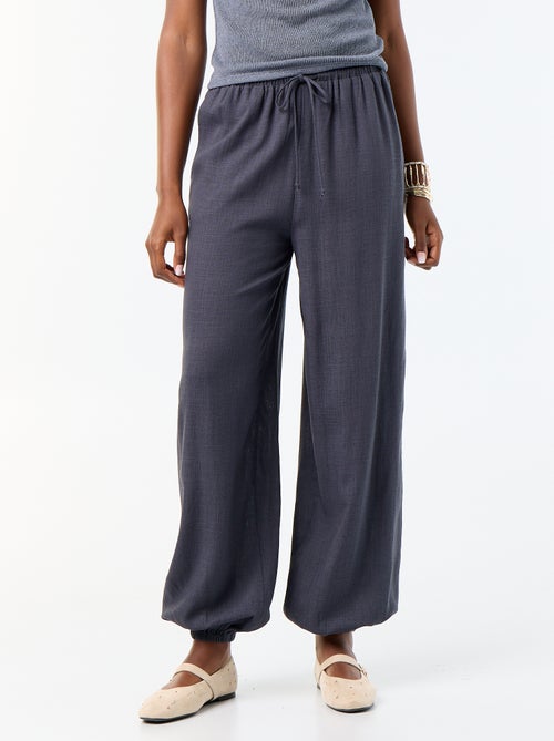 Pantalone a palloncino tinta unita con 2 tasche - Kiabi Pantalone a palloncino tinta unita con 2 tasche - Kiabi