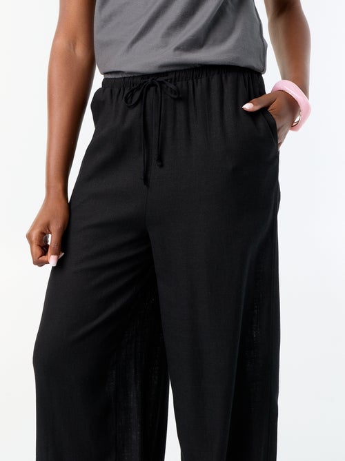 Pantalone a palloncino tinta unita con 2 tasche - Kiabi Pantalone a palloncino tinta unita con 2 tasche - Kiabi