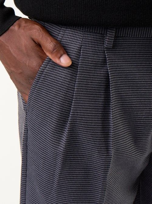 Pantalone a quadri dal taglio affusolato - Kiabi Pantalone a quadri dal taglio affusolato - Kiabi
