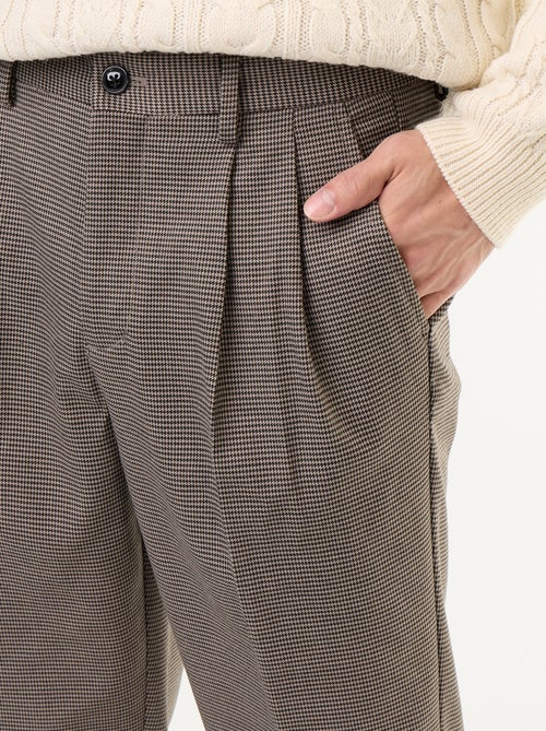 Pantalone a quadri dal taglio affusolato - Kiabi Pantalone a quadri dal taglio affusolato - Kiabi