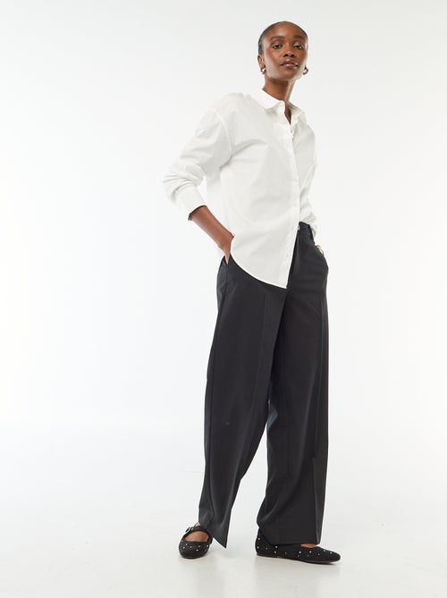 Pantalone ampio a vita alta con cintura e passanti - Kiabi Pantalone ampio a vita alta con cintura e passanti - Kiabi