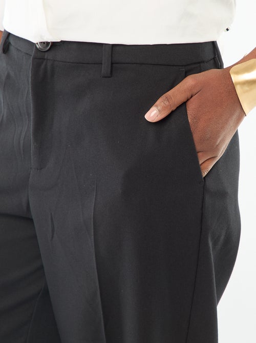 Pantalone ampio a vita alta con cintura e passanti - Kiabi Pantalone ampio a vita alta con cintura e passanti - Kiabi