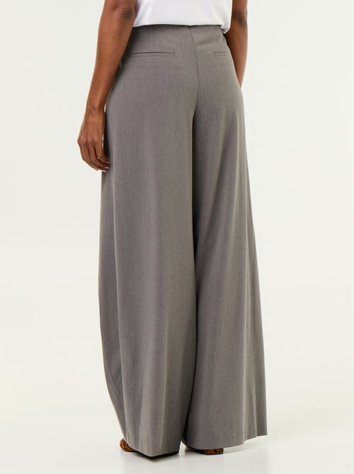 Pantalone ampio a vita alta con pinces - Kiabi Pantalone ampio a vita alta con pinces - Kiabi