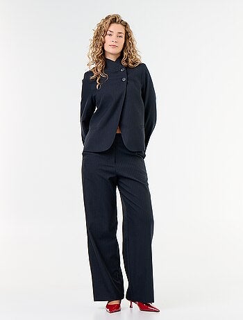 Pantaloni ampi con bottoni dorati