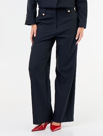 Pantaloni ampi con bottoni dorati