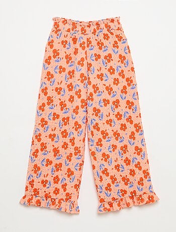 Pantaloni ampi con fondo a balze