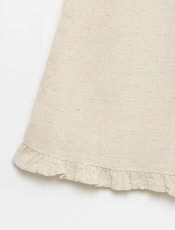 Pantalone con volant sul fondo gamba