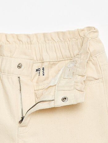 Pantalone denim mom a vita alta