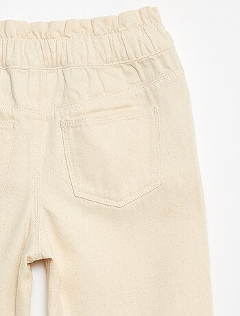 Pantalone denim mom a vita alta