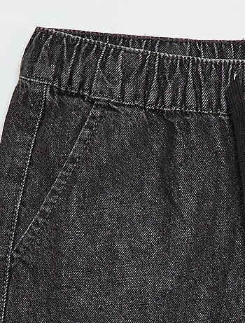 Pantalone denim taglio jogger