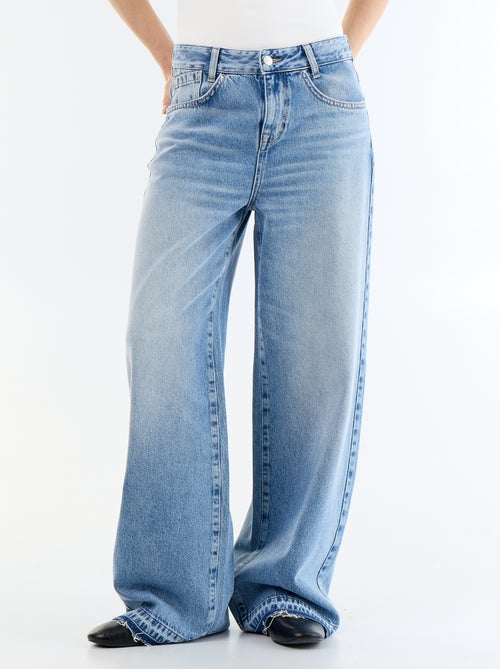 Pantalone in denim a gamba larga effetto slavato - Kiabi Pantalone in denim a gamba larga effetto slavato - Kiabi