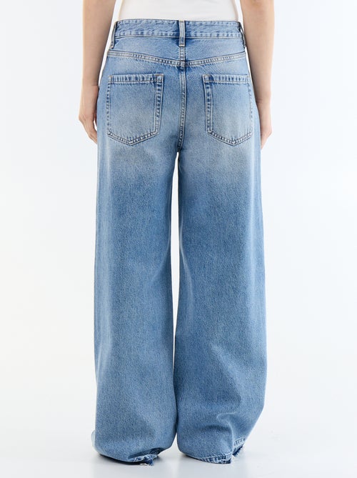 Pantalone in denim a gamba larga effetto slavato - Kiabi Pantalone in denim a gamba larga effetto slavato - Kiabi