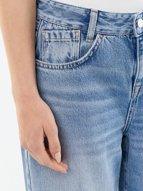 Pantalone in denim a gamba larga effetto slavato - Kiabi Pantalone in denim a gamba larga effetto slavato - Kiabi