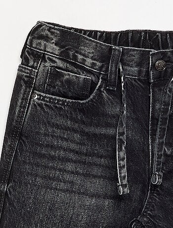 Pantalone in denim a gamba larga