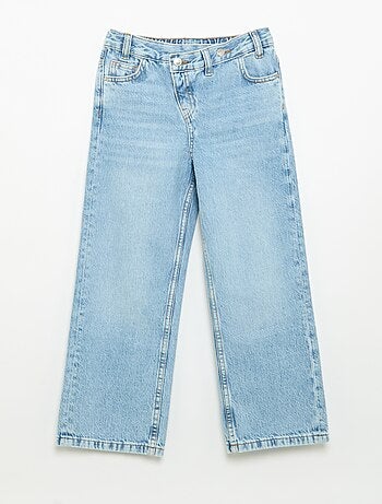 Pantalone in denim con abbottonatura asimmetrica