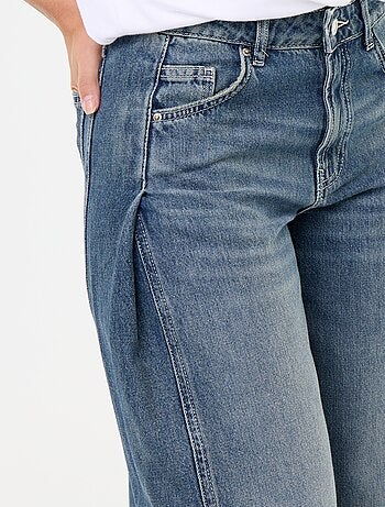 Pantalone in denim con pinces decorative