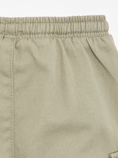 Pantalone jogger in twill con tasche a patta - Kiabi Pantalone jogger in twill con tasche a patta - Kiabi
