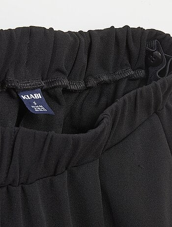 Pantalone largo da donna a vita alta in maglia leggera