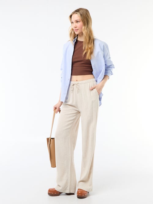 Pantalone largo da donna in lino con vita elasticizzata - Kiabi Pantalone largo da donna in lino con vita elasticizzata - Kiabi