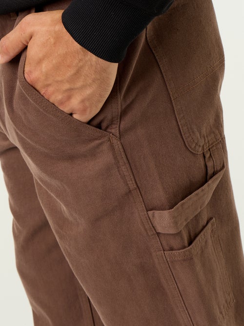 Pantalone stile carpenter in denim - Kiabi Pantalone stile carpenter in denim - Kiabi