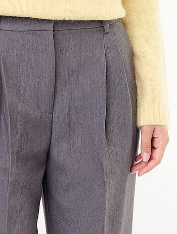 Pantalone taglio carota vita alta
