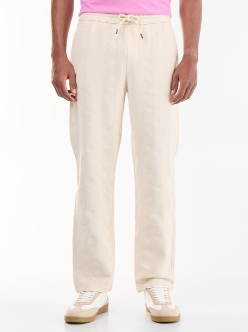 Pantalone tinta unita in tessuto testurizzato - Kiabi