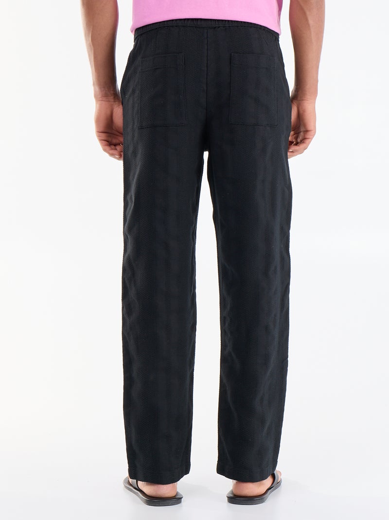 Pantalone tinta unita in tessuto testurizzato Nero - Kiabi