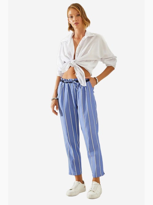 Pantaloni a carota con elastico in vita a righe lucci - Kiabi