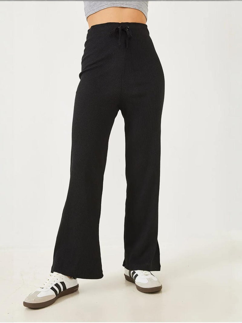 Pantaloni a coste a gamba larga con cintura lucci Nero - Kiabi