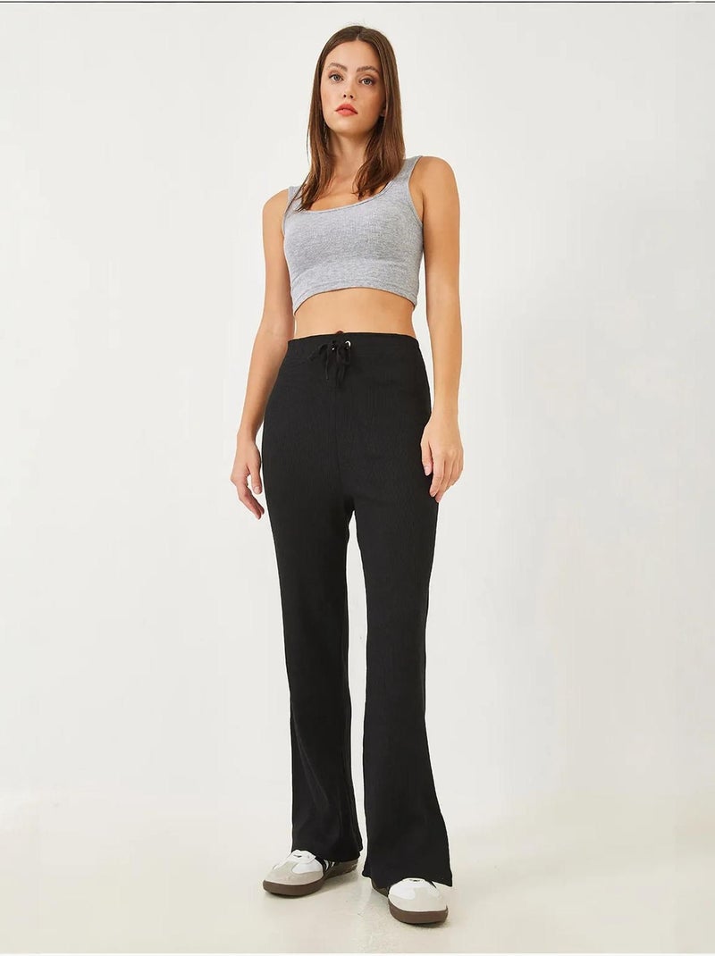 Pantaloni a coste a gamba larga con cintura lucci Nero - Kiabi