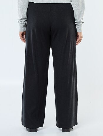 Pantaloni a coste ampi tinta unita