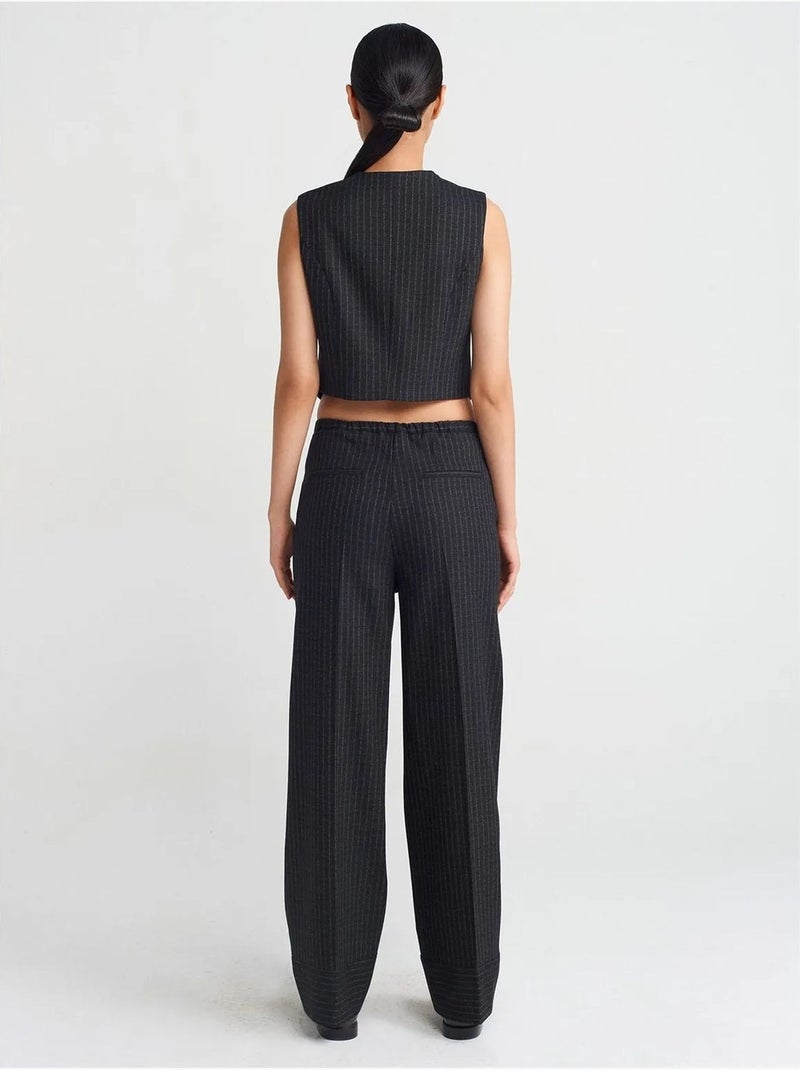 Pantaloni a gamba ampia a righe dilvin Nero - Kiabi