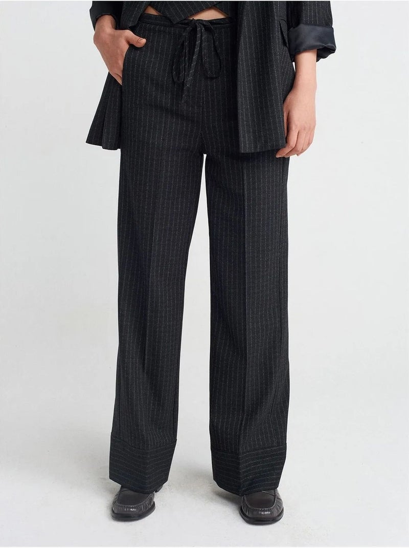 Pantaloni a gamba ampia a righe dilvin Nero - Kiabi