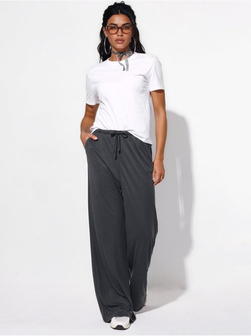Pantaloni a gamba ampia con coulisse busem - Kiabi Pantaloni a gamba ampia con coulisse busem - Kiabi