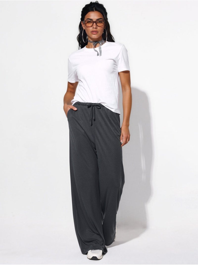 Pantaloni a gamba ampia con coulisse busem Grigio nero - Kiabi