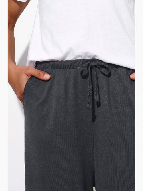 Pantaloni a gamba ampia con coulisse busem - Kiabi Pantaloni a gamba ampia con coulisse busem - Kiabi