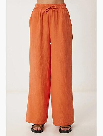 Pantaloni a gamba ampia con coulisse in vita e dettaglio con bordino istanbul