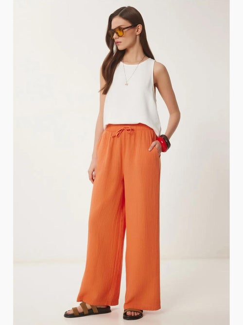 Pantaloni a gamba ampia con coulisse in vita e dettaglio con bordino istanbul - Kiabi