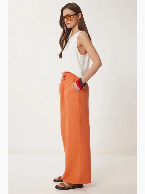 Pantaloni a gamba ampia con coulisse in vita e dettaglio con bordino istanbul - Kiabi