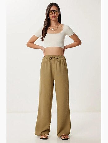 Pantaloni a gamba ampia con coulisse in vita e dettaglio con bordino istanbul