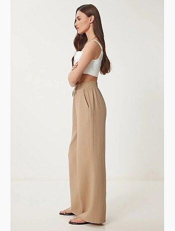 Pantaloni a gamba ampia con coulisse in vita e dettaglio con bordino istanbul