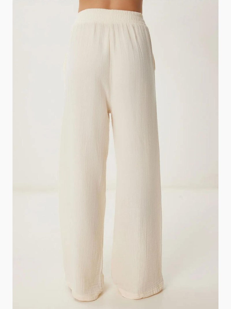Pantaloni a gamba ampia con coulisse in vita e dettaglio con bordino istanbul Crema - Kiabi