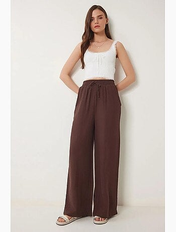 Pantaloni a gamba ampia con coulisse in vita e dettaglio con bordino istanbul