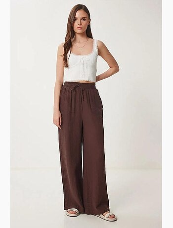 Pantaloni a gamba ampia con coulisse in vita e dettaglio con bordino istanbul