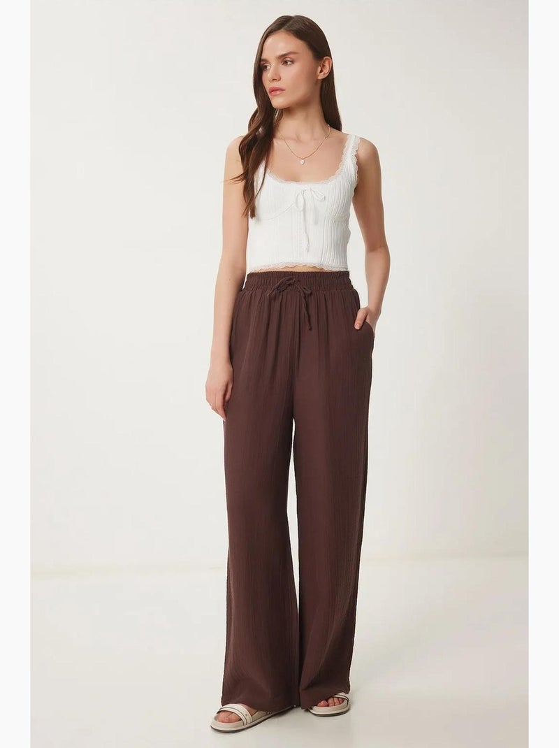 Pantaloni a gamba ampia con coulisse in vita e dettaglio con bordino istanbul Marrone - Kiabi