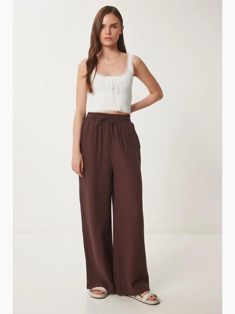 Pantaloni a gamba ampia con coulisse in vita e dettaglio con bordino istanbul Marrone - Kiabi