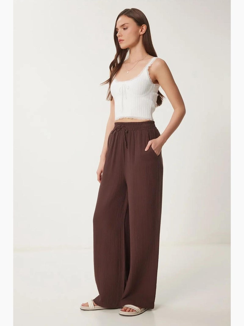 Pantaloni a gamba ampia con coulisse in vita e dettaglio con bordino istanbul Marrone - Kiabi